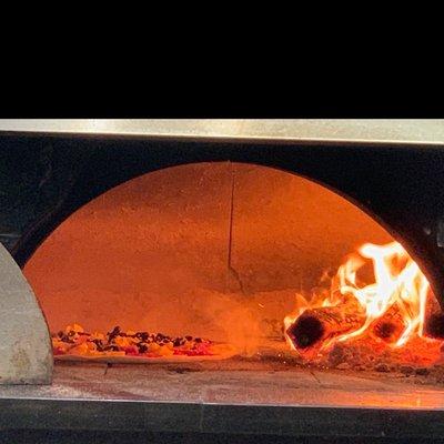 Coal fired pizza! What could be better? Pizza is delicious here as well as the giant serving of spaghetti and meatballs! Love this place!