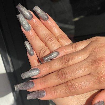 Silver cat eye nail design