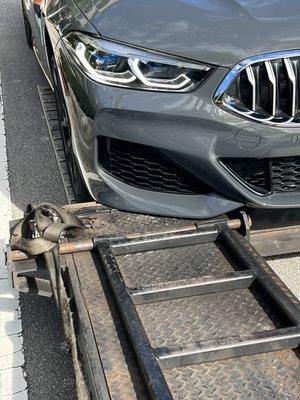 My car being supported by front end when unloading.