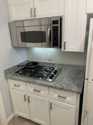 New cabinets and granite countertops.