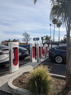 12 Tesla Superchargers. 10 in use @ 9:00 on a Monday.