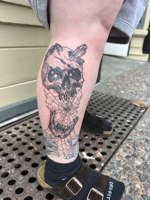 Black and gray fine line skull tattoo