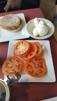 Side order tomatoes and nicely seasoned turkey sausage.