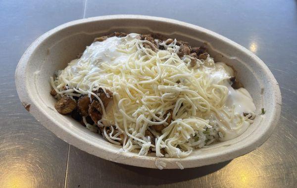 Chicken Burrito Bowl (with White Rice, Black Beans, Queso, Sour Cream, and Cheese)