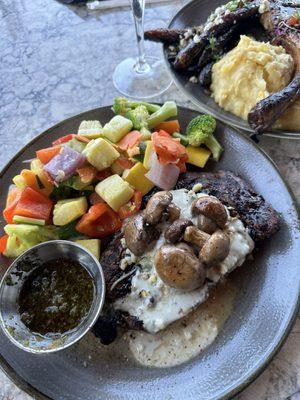 Aged Ribeye topped with mushrooms and blue cheese