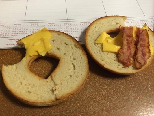 This is my bacon and cheese bagel from Dunkin Donuts in Stevensville, MD.  Two bites and not one piece of bacon and only a sliver of cheese.