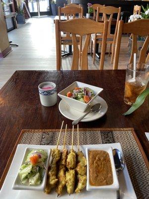 Chicken satay and cucumber salad