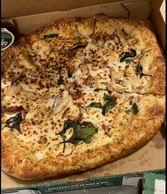 Garlic Epic stuffed crusted pizza with chicken, bacon, spinach, Alfredo