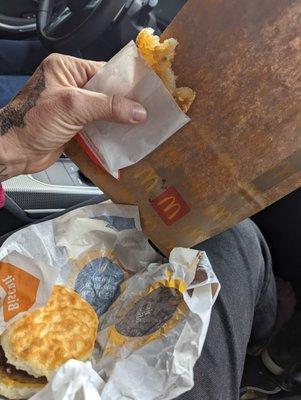 Sausage and egg biscuit and hash brown.