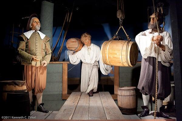 Loading casks of rum. A historical scene of Salem.