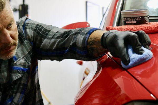 Expert detailer Jeremy Stevens applying our Signature Shine carnauba paste wax. Easy to apply and remove with incredible results.