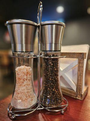 Fancy pink salt and pepper for your fired chicken.