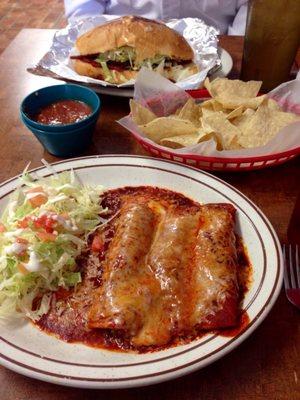 Chicken Enchiladas Mexicana with a side salad and a torta al pastor