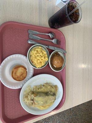 Ribs and sauerkraut, Mac and cheese mashed potatoes with gravy and cornbread