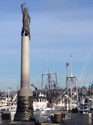 Fishermen's Memorial with man on mast