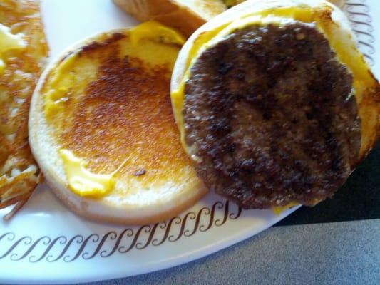 $1 cheeseburgers...on a nicely toasted bun. Where else are you going to find such a deal?