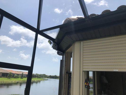 Motorized roll down hidden in the soffit.