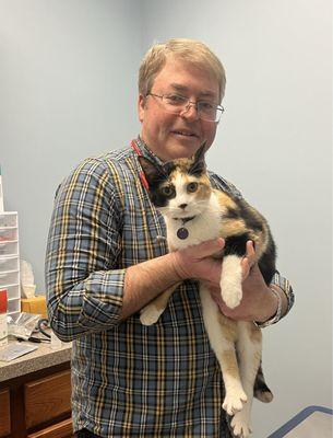 Dr. Branstutter with calico cat