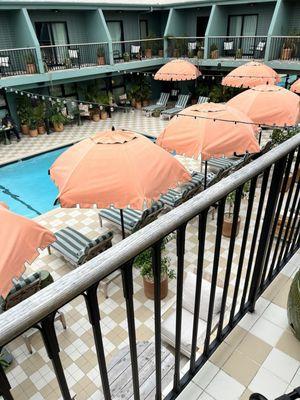 Looking down into the excellent pool area from our balcony. Very clean and well maintained pool and lobby area.