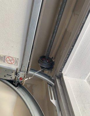 Garage door repair; replace tension cables