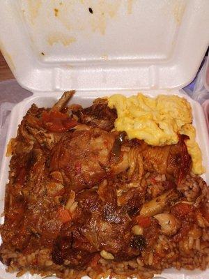 Brown stew chicken, rice & peas, with mac & cheese.