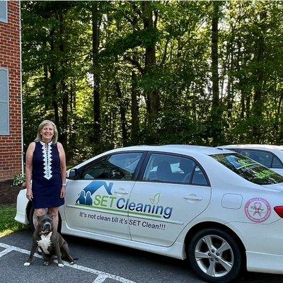 Suzanne & Blu in front of SET Cleaning Car