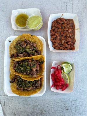 Ribeye tacos, beans, salsa, pickled onions, lime