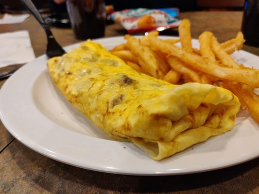 Build your own omelette Cooper sharp cheese w/ sausage and bacon.