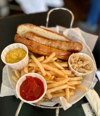 Sausage Basket; bratwurst with sauerkraut, mustard and French fries