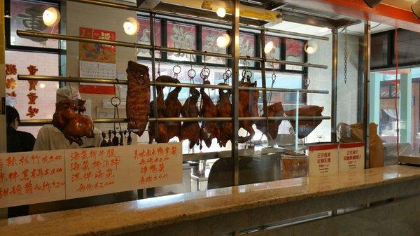 Picking up some roasted pork for dinner. Yum!