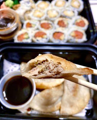 Yaki Gyoza - pan fried dumplings with beef and vegetables & savory dipping sauce - filling