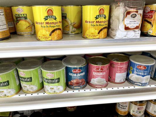 Giant cans of Rasgulla and Ras Malai