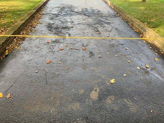 Tire tracks and foot prints as a finished seal coating job?