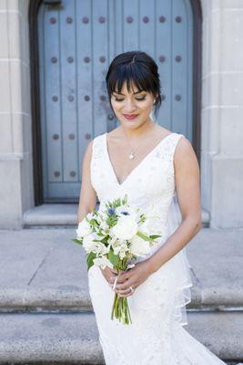 Portrait of Bride holding bouquet