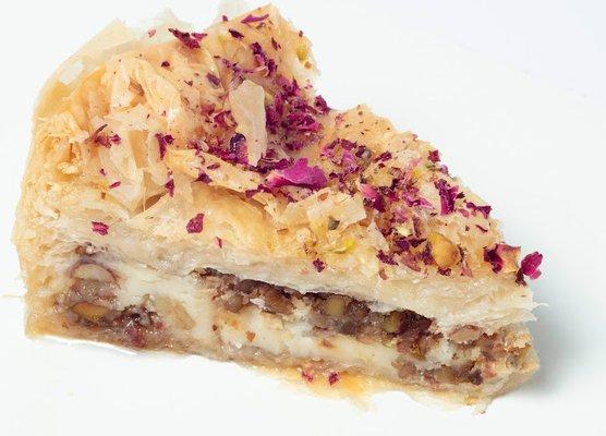 Baklava Cheese Cake -- Velvety goodness of cheesecake with the nutty, honeyed allure of traditional baklava.