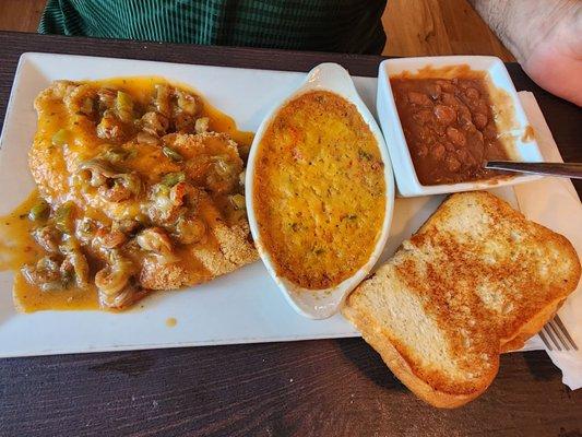 Catfish Acadiana- Fried catfish topped with crawfish etouffe, crawfish dressing and big zachs beans.