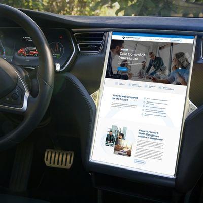 Website design shown on Tesla car screen