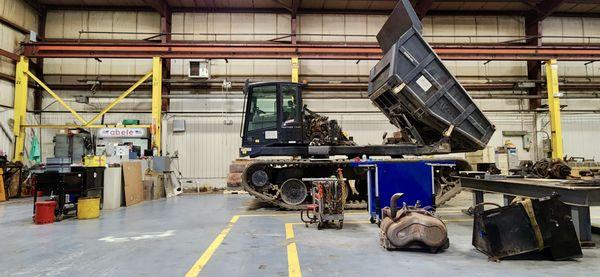 Heavy equipment warehouse for repairs and maintenance on large machines.