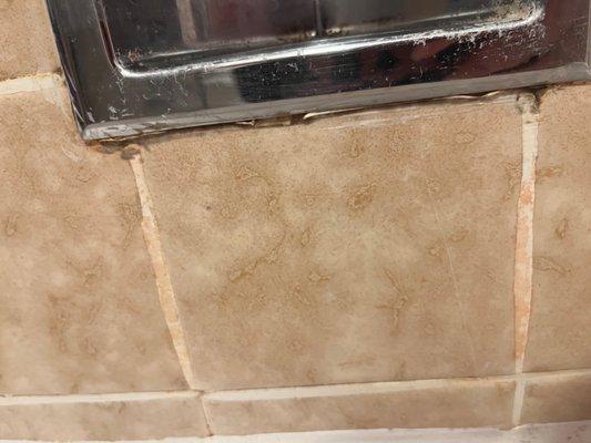 More soap scum in bathroom