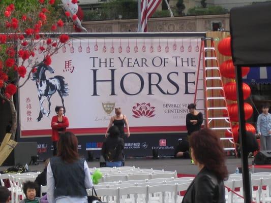 Year Of The Horse & Happy 100th Bev Hills! Ribbon dancers rehearse pre-festivities.