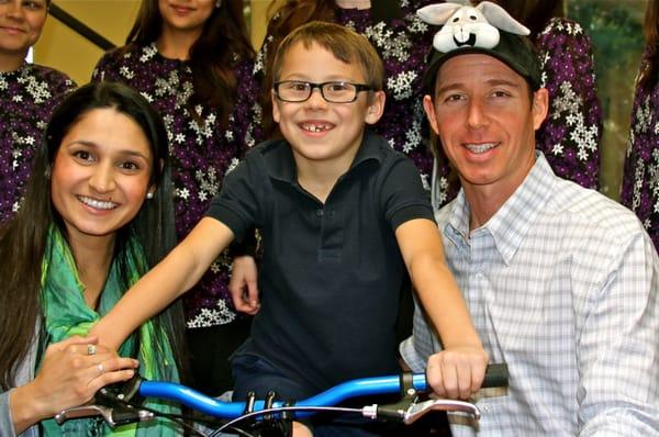 Dr. Rabitz and Dr. Suzy with the No Cavity Bike Winner of 2014!