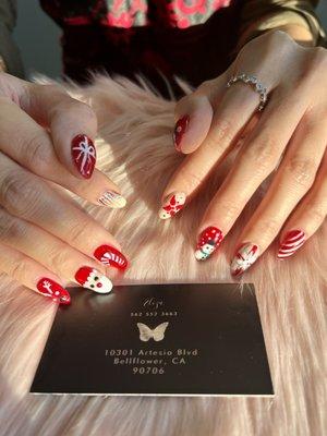 Our client loves her Christmas Decorations on Gel X Nails!!! w/Santa, Snowflakes, snow and snowman
 Design - By Eliza