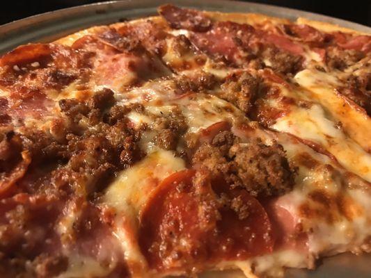 Thin crust all meat pizza