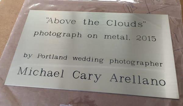 Here's the engraved metal plaque they made for me. My 25-ft metal photo is in the lobby of the US Bancorp Tower ("Big Pink")