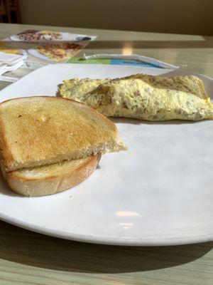 Omelette (you choose the ingredients) & homemade white bread.