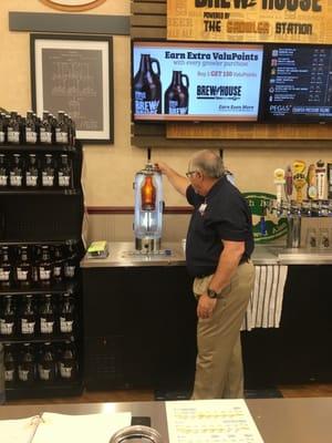 Filling growlers with Jack at Food City