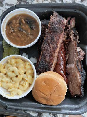 Triple Threat; Brisket, Ribs and Sausage Side: Mac N Cheese and Baked Beans