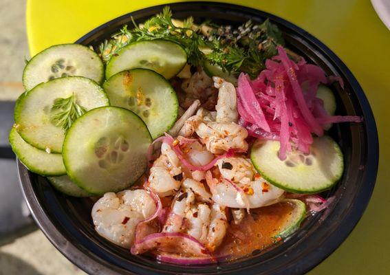 Classic aquachile with shrimp, cilantro, cucumber, pineapple and red onions