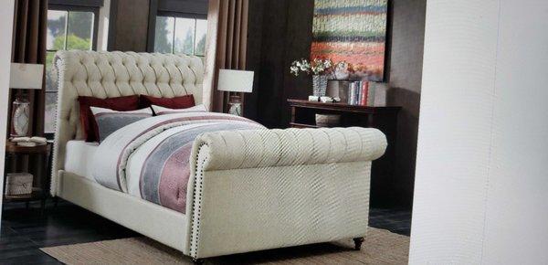 Upholstered Sleigh Bed. Also comes in grey and Navy blue.. Gotta love it!!!  729.00