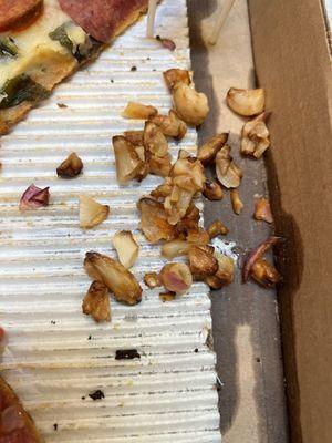 This is just some of the pile of garlic that they put in the pizza. It's all that could be smelled or tasted.